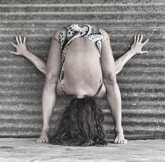 womone bending over with amazing hip mobility