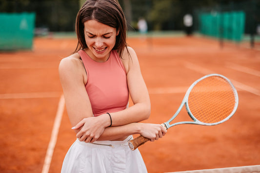lady tennis player with tennis elbow lateral epicondylitis not knowing it could be neck related